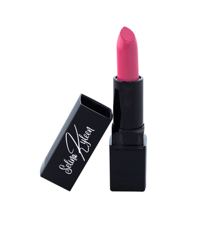 Pink lipstick in black tube with Selina Kyleen logo, white background