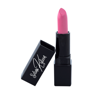 Selina Kuleen pink lipstick with black case and cap on white background