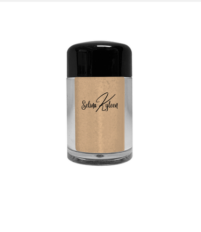 Selina Kyleen loose powder makeup in clear jar with black lid on white background