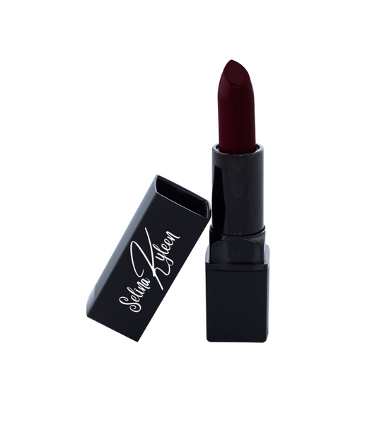 Dark red Selina Kileen lipstick in black tube with open cap on white background